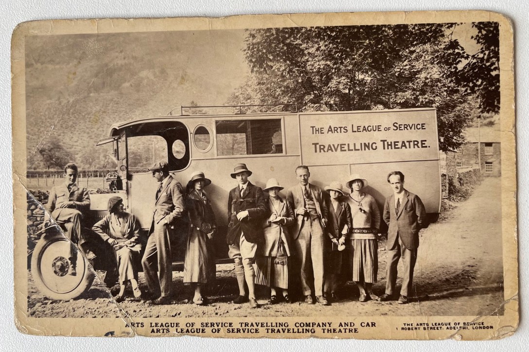 A postcard of the Arts League of Service in front of their van, early 1920s